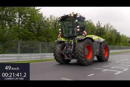 The Claas Xerion 5000 TRAC VC tractor racing on Germany's Nürburgring Nordschleife