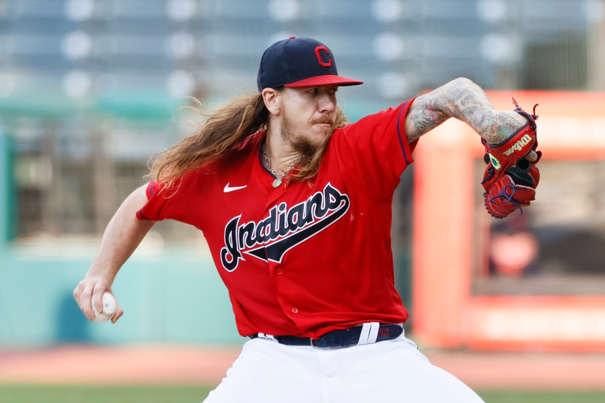 Starting pitcher Mike Clevinger of the Cleveland Indians pitches against the Cincinnati Reds during the first inning at Progressive Field on August 05, 2020 in Cleveland, Ohio. (Photo by Ron Schwane/Getty Images)