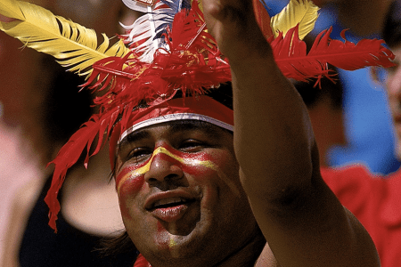A fan of the Kansas City Chiefs dressed in a. head dress (Earl Richardson /Allsport)