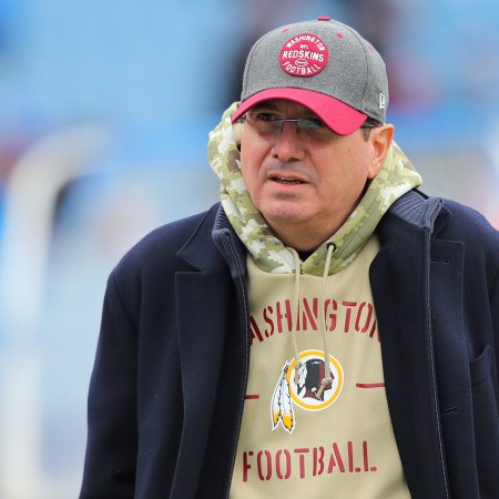 Washington Football Team owner Dan Snyder on the field before a game in November 2019