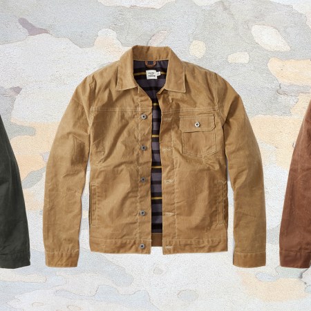 Three different colors of Flint and Tinder's men's flannel-lined waxed trucker jacket