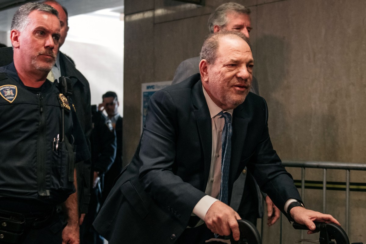 Harvey Weinstein using a walker