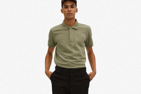 Man wearing a green Everlane polo