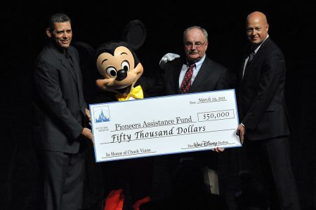 Executive Director of Will Rogers Motion Pictures Pioneers Foundation Todd Vradenburg, Mickey Mouse, Chairman the Will Rogers Motion Picture Pioneers Foundation Chuck Viane, and The Walt Disney Studios president of Distribution Bob Chapek attend the CinemaCon, the official convention of the National Association of Theatre Owners, at The Colosseum of Caesars Palace on March 29, 2011 in Las Vegas, Nevada.