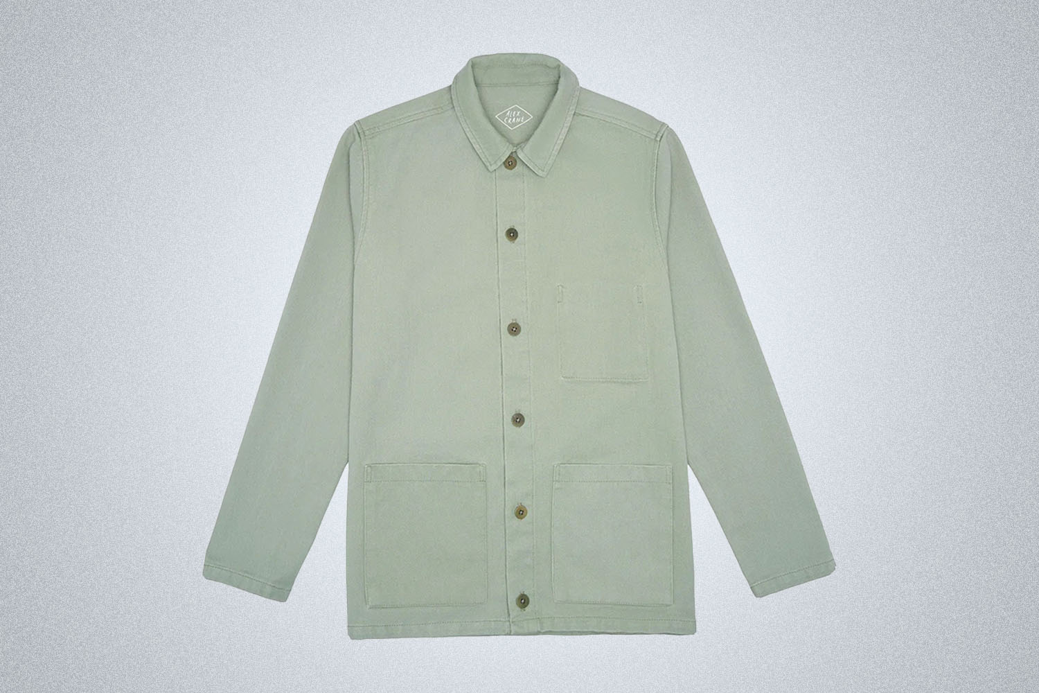 a light green Alex Crane Chore Coat on a grey background