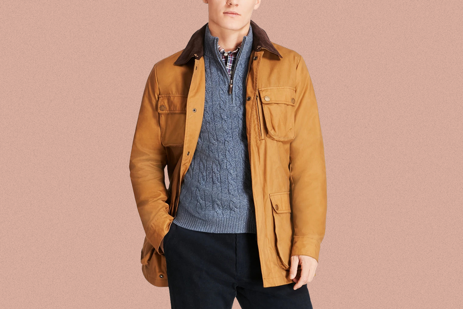 A man wearing a waxed field jacket from Brooks Brothers
