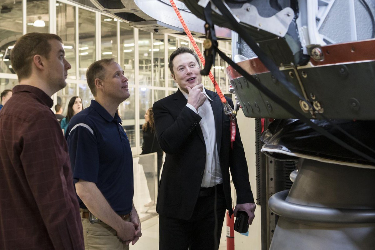 SpaceX Vice President of Propulsion Engineering Will Heltsley, NASA Administrator Jim Bridenstine and SpaceX CEO Elon Musk