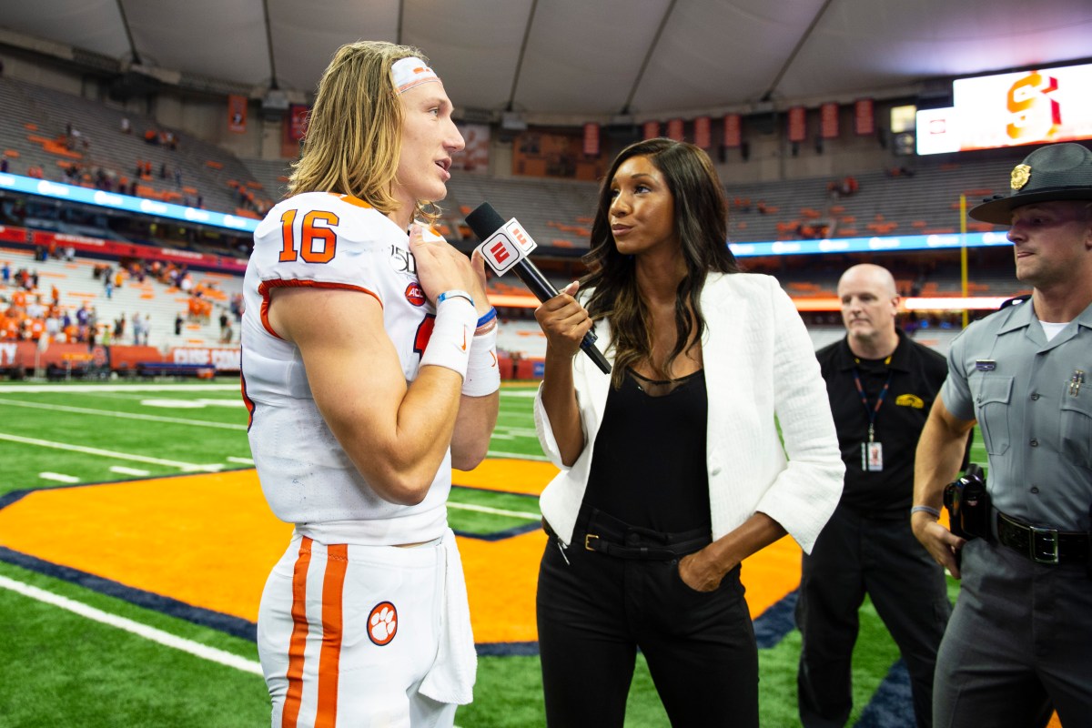ESPN's Maria Taylor interviews Clemson Tigers Quarterback Trevor Lawrence (16) after the game between the Clemson Tigers and the Syracuse Orange on September 14, 2019, at the Carrier Dome in Syracuse, NY. (Photo by Gregory Fisher/Icon Sportswire via Getty Images)