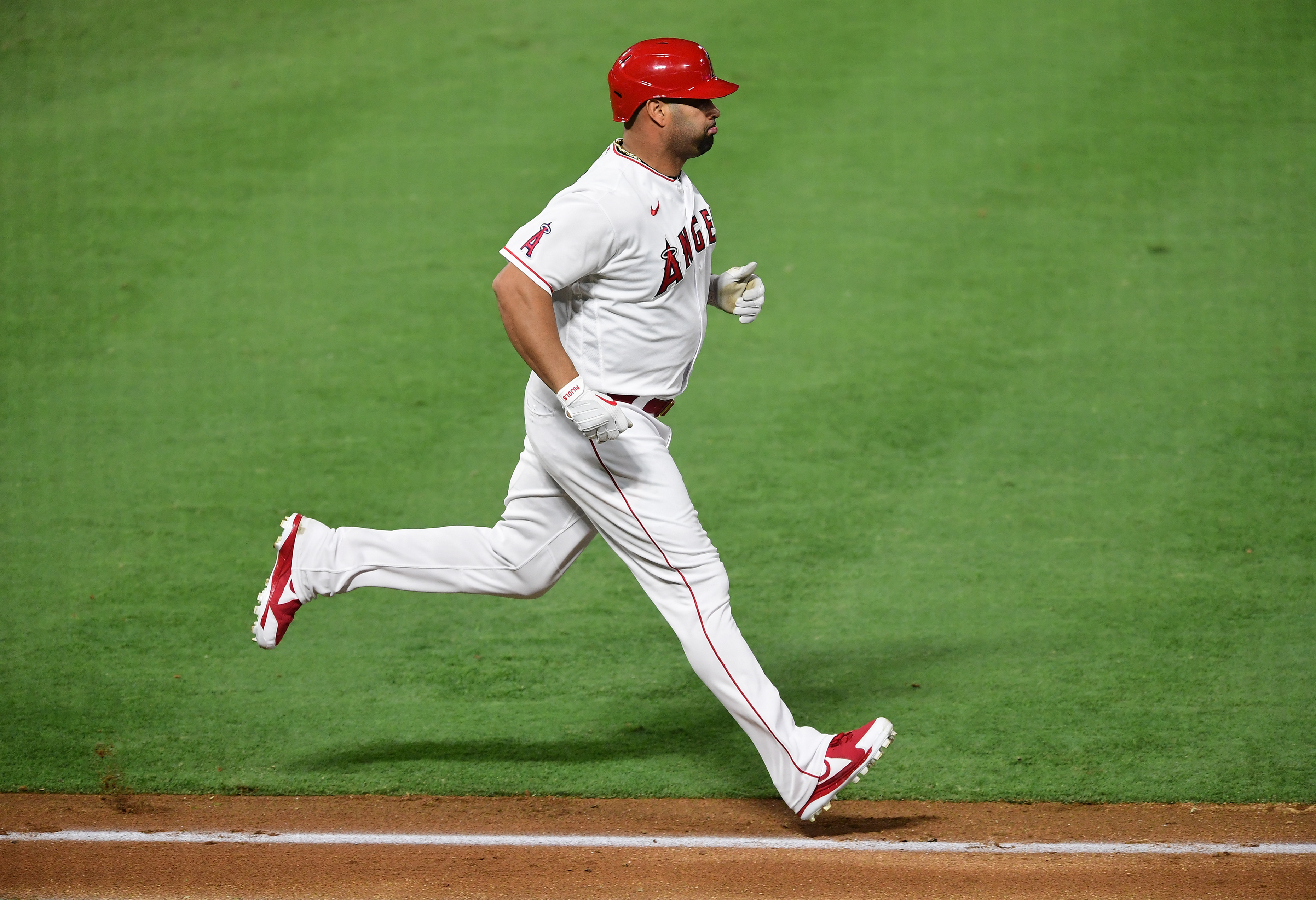 Albert Pujols passed WIllie Mays for fifth in home runs with 661.