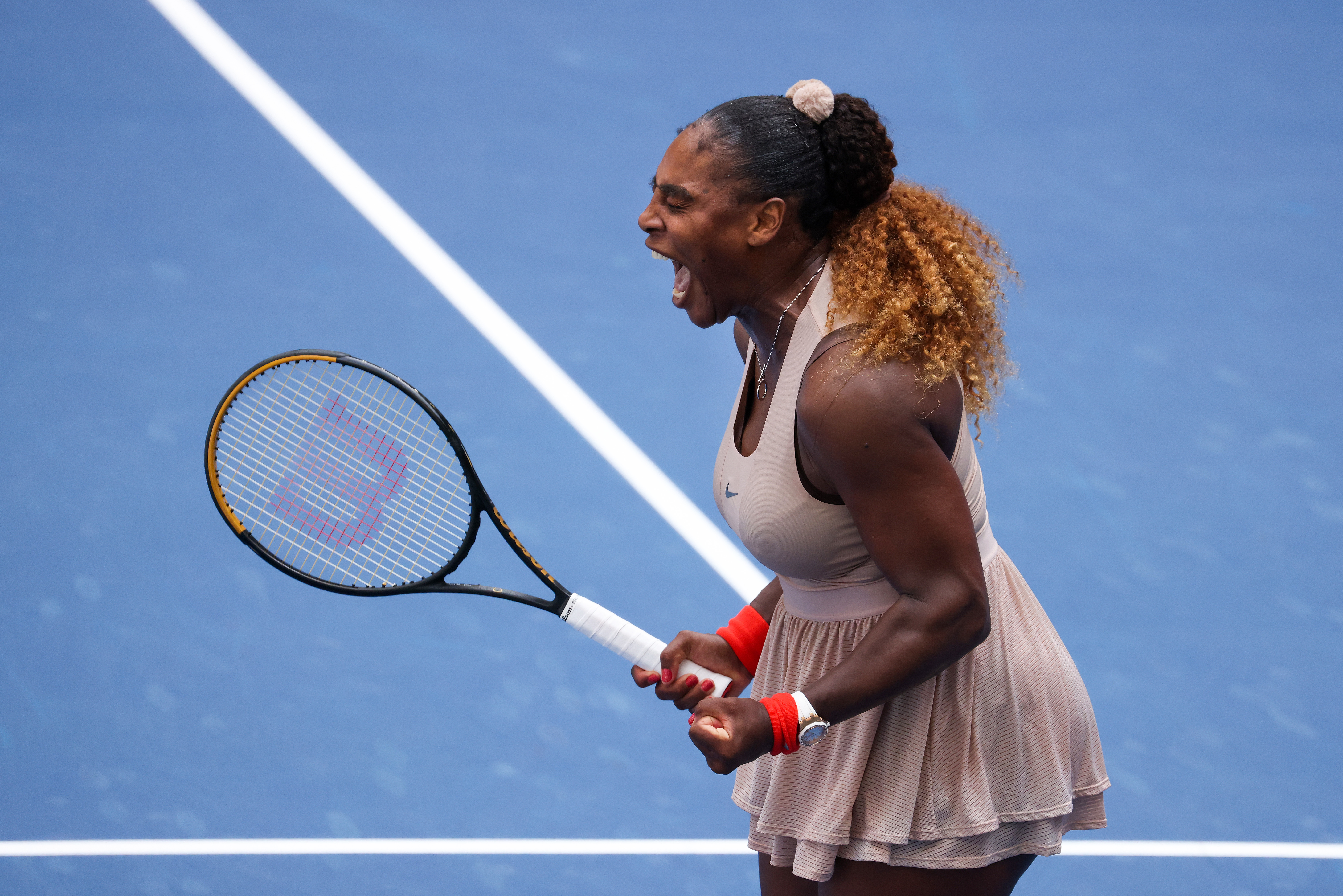 Serena Williams celebrates winning match point