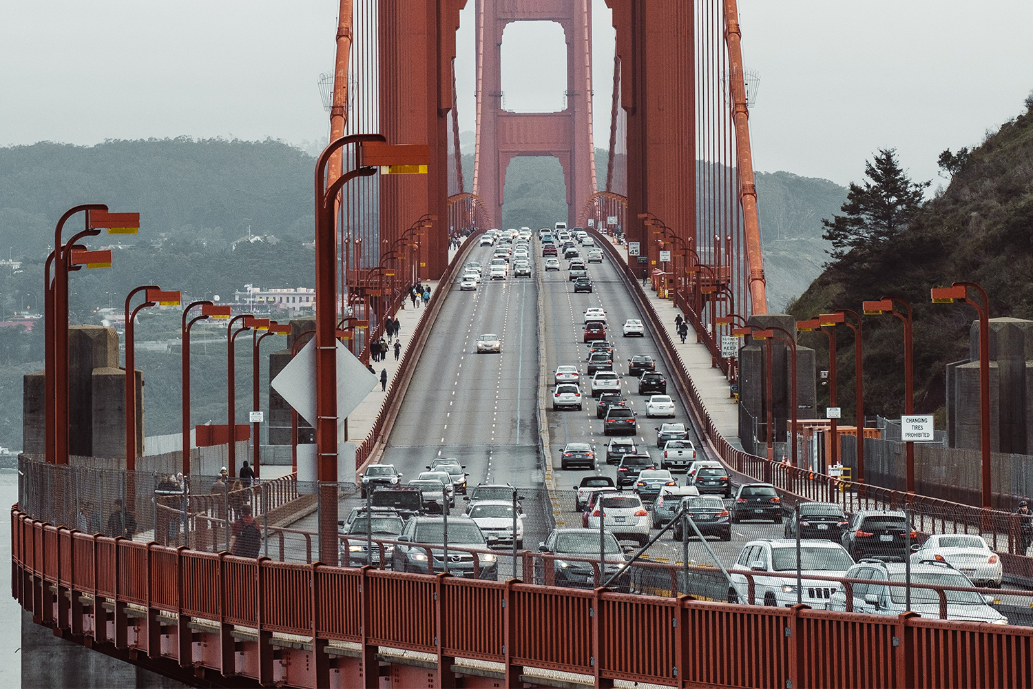 Cars driving across the Golden Gate Bridge in San Francisco, California