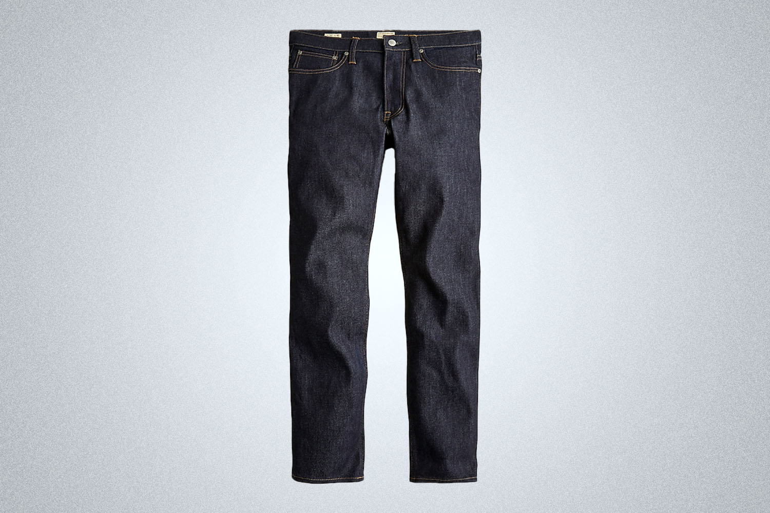 a pair of dark rinse denim jeans.