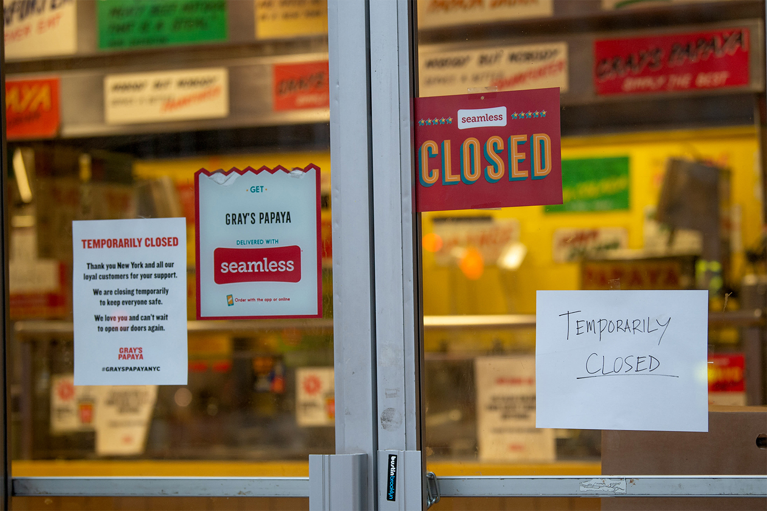 Closed signs hang on Gray's Papaya amid the coronavirus pandemic in New York City