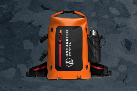 The orange Seventy2 Pro Survival System go bag from Uncharted Supply Co.