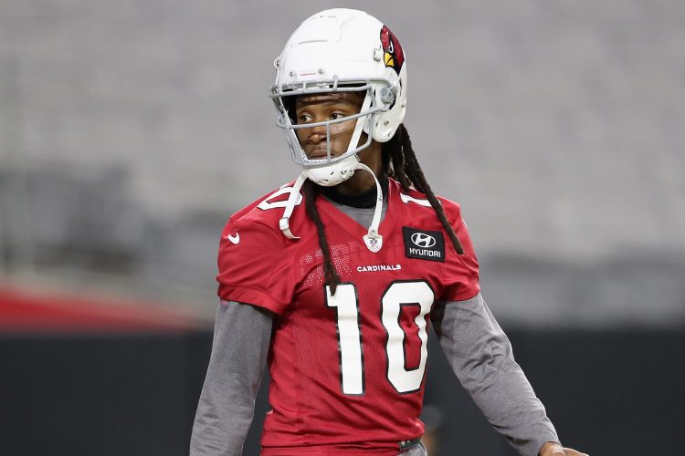 Wide receiver DeAndre Hopkins walks on the field during Cardinals training camp