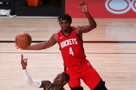 Danuel House Jr. of the Houston Rockets battles for the ball.