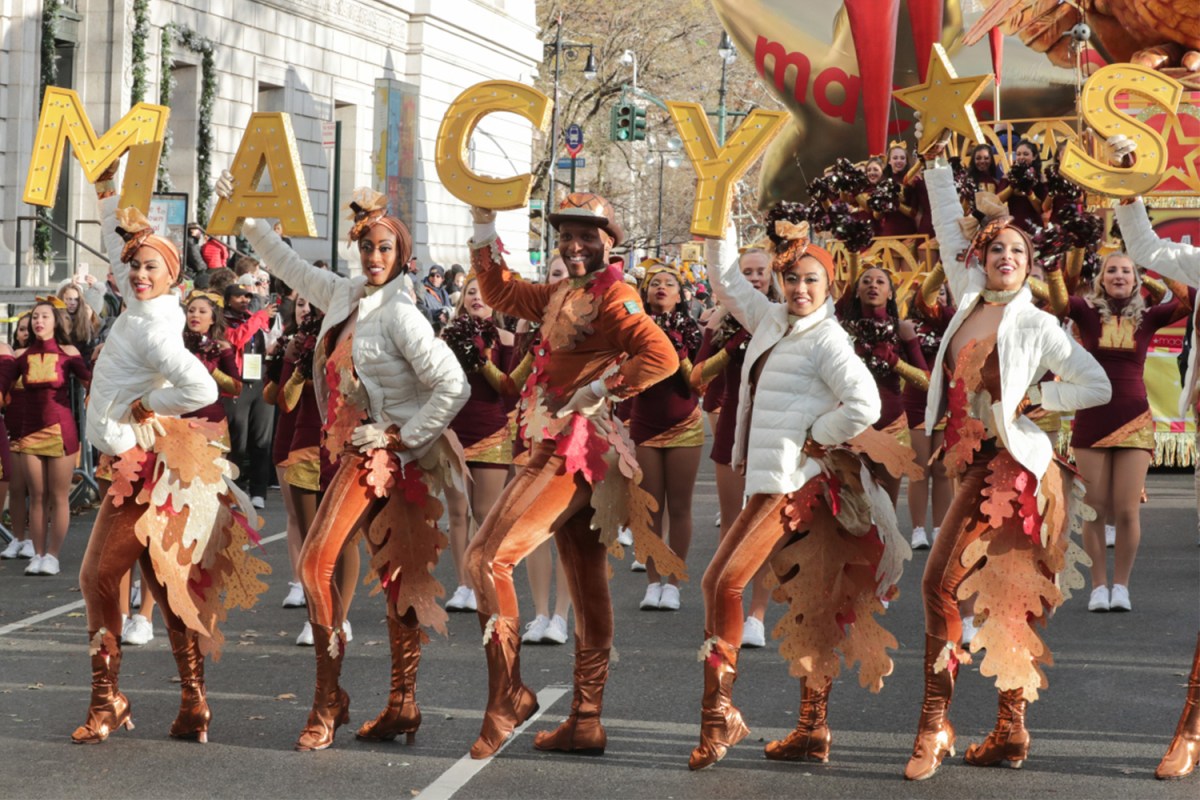 Dancers in turkey outfits during the 93rd Macy's Thanksgiving Day Parade on November 28, 2019 in New York City