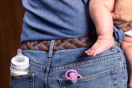 man taking care of baby