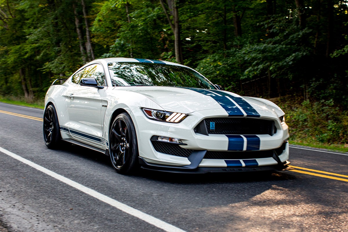 The 2020 Ford Mustang Shelby GT350R Heritage Edition in white and blue on the road