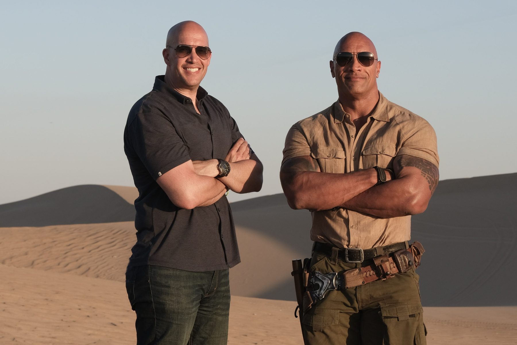 <p><span style="font-weight: 400">Hiram Garcia first met Dwayne “The Rock” Johnson when he was 15 years old and Johnson was dating his sister. While it didn’t work out between the couple, Garcia and Johnson formed a lingering bond and are now producing partners via Seven Bucks Productions. As president of production at Seven Bucks, Garcia has unprecedented access to capture images of his famous friend on and off set. He began putting that access to use when Johnson was filming </span><i><span style="font-weight: 400">Baywatch,</span></i><span style="font-weight: 400"> </span><i><span style="font-weight: 400">Fast and Furious 8</span></i><span style="font-weight: 400"> and </span><i><span style="font-weight: 400">Jumanji: Welcome to the Jungle. "</span></i><span style="font-weight: 400">That run of three movies is where my photography really exploded, because I started to embrace it more, not only as a hobby, but as a tool to help drive the narrative for these films we were working on.” Those photos and many others are collected in </span><a href="https://bookshop.org/books/the-rock-through-the-lens-his-life-his-movies-his-world/9781250220424?aid=6018"><i><span style="font-weight: 400">The Rock: Through the Lens: His Life, His Movies, His World</span></i></a> <span style="font-weight: 400">from St. Martin’s Press. Herein: a preview of Garcia’s favorite images from the book, and the stories behind them.</span></p>