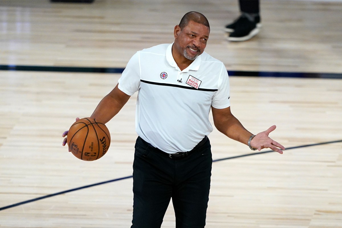 Head coach Doc Rivers of the Los Angeles Clippers reacts while talking to an official during the first half of an NBA basketball game against the Dallas Mavericks