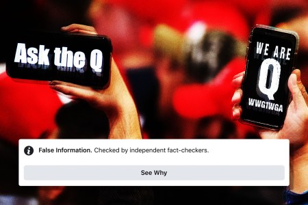 Supporters of President Donald Trump hold up their phones with messages referring to the QAnon conspiracy theory at a campaign rally at Las Vegas Convention Center on February 21, 2020 in Las Vegas, Nevada. 