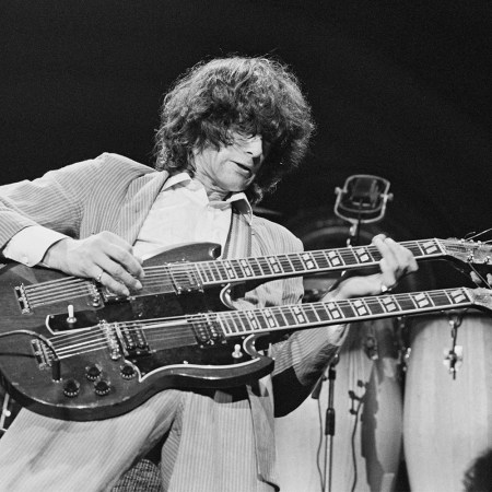 Jimmy Page playing “Stairway to Heaven” on a double neck guitar