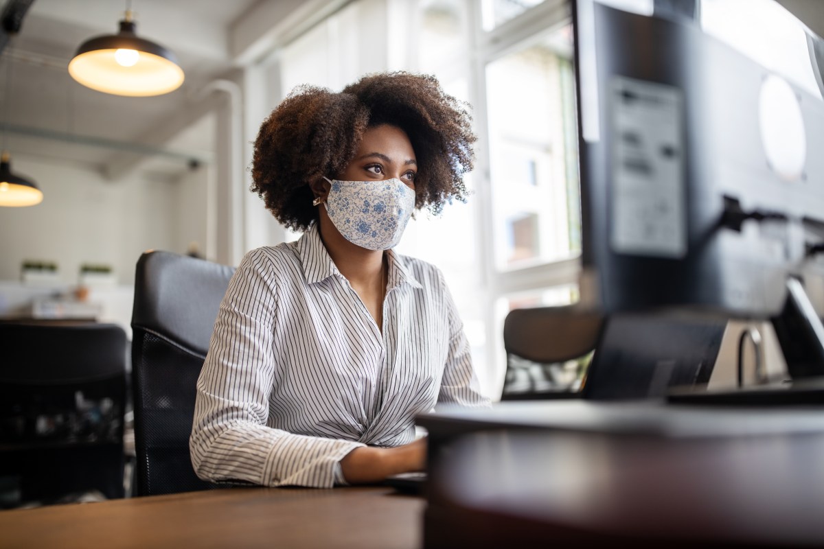 woman at work wearing mask