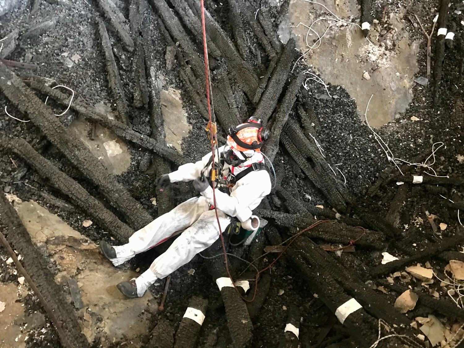 Rope access worker and damaged timbers