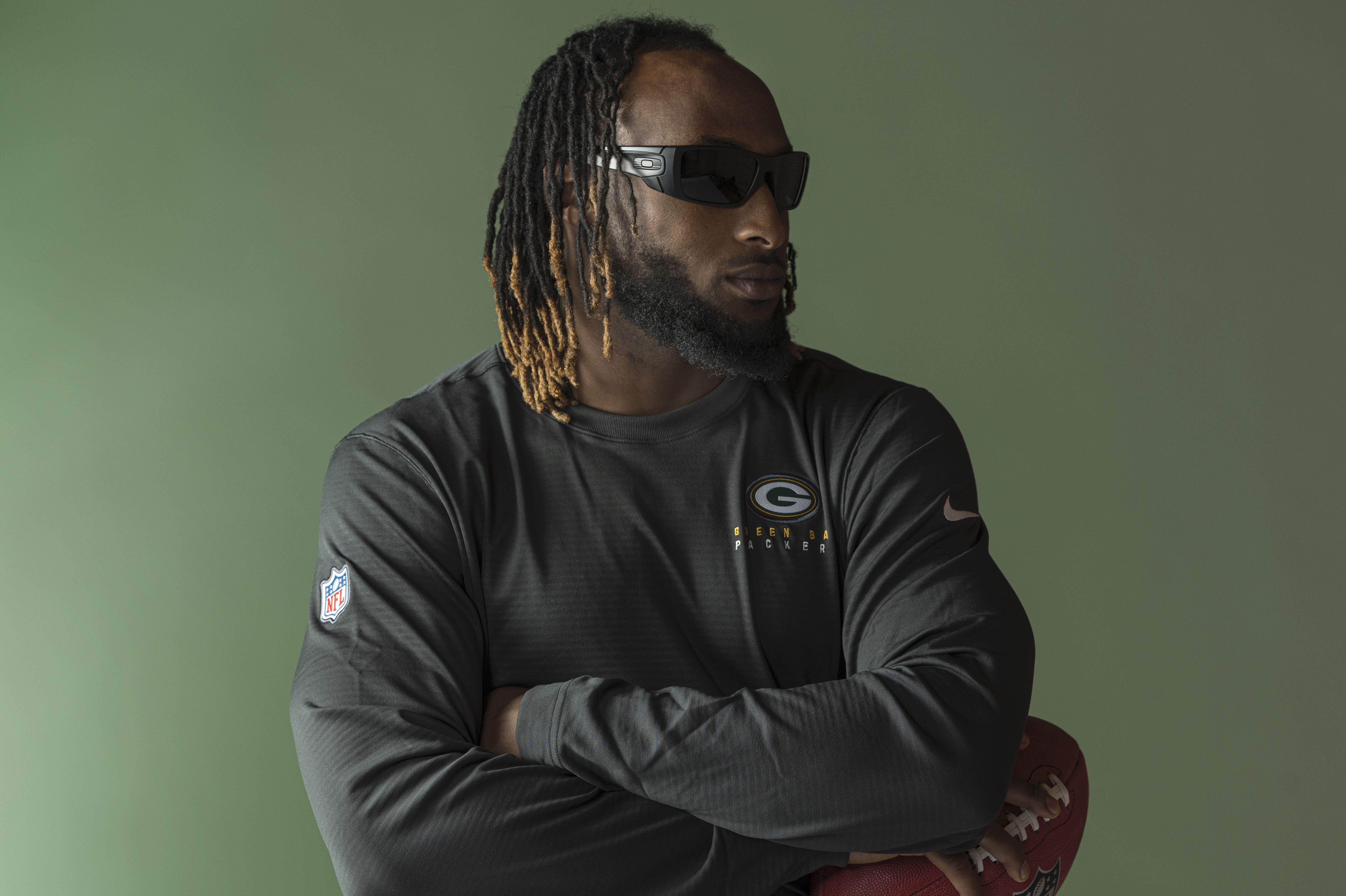 Aaron Jones rocking some Oakleys the same way he does on the sidelines.