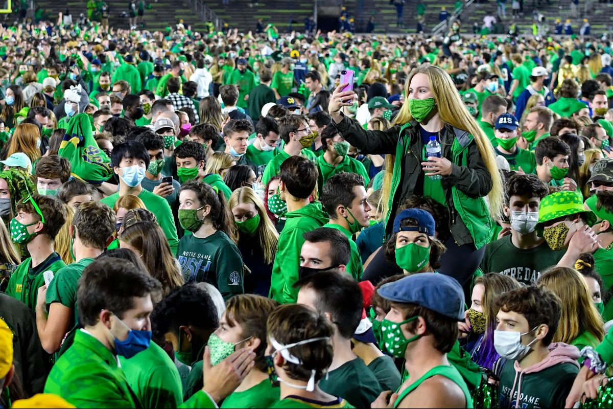 Notre Dame President Who Went Maskless at White House Event Rips Students For Rushing Field After Win