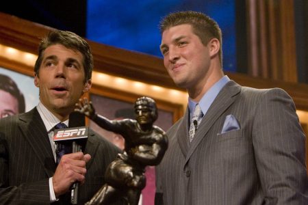 Luke Bryan Buys, Curses Tim Tebow's Heisman Trophy Prior to Georgia-Florida