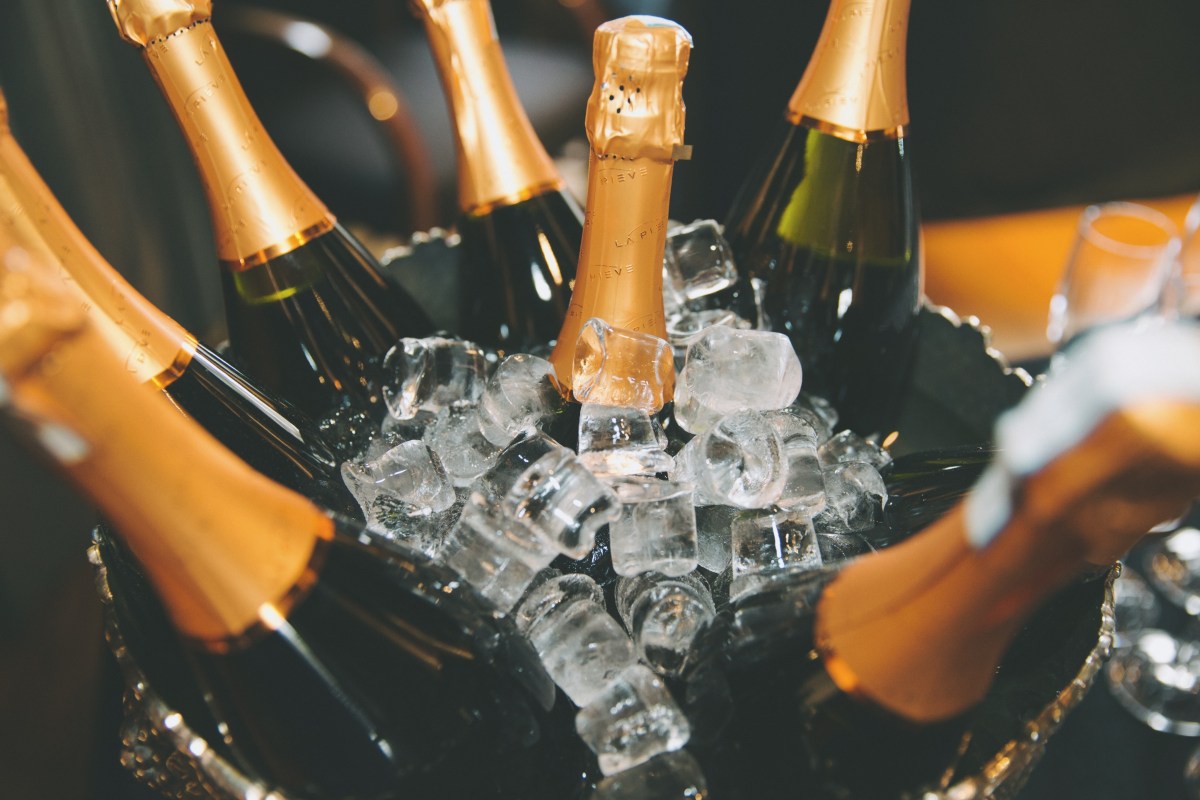 Bottles Of Champagne In Ice Bucket