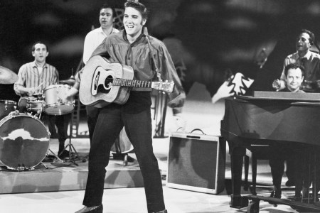 elvis presley playing guitar