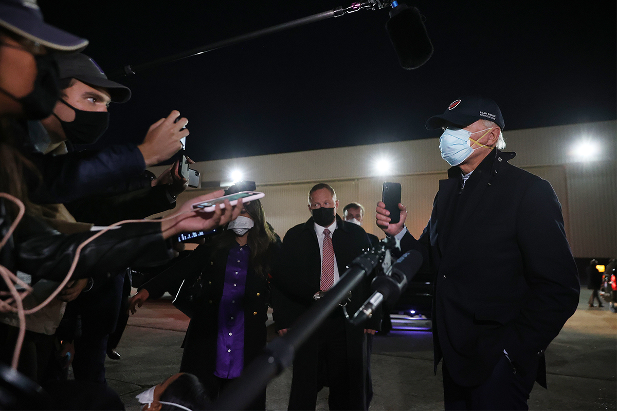 Biden wearing two masks