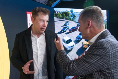 Tesla CEO Elon Musk and Volkswagen's Herbert Diess