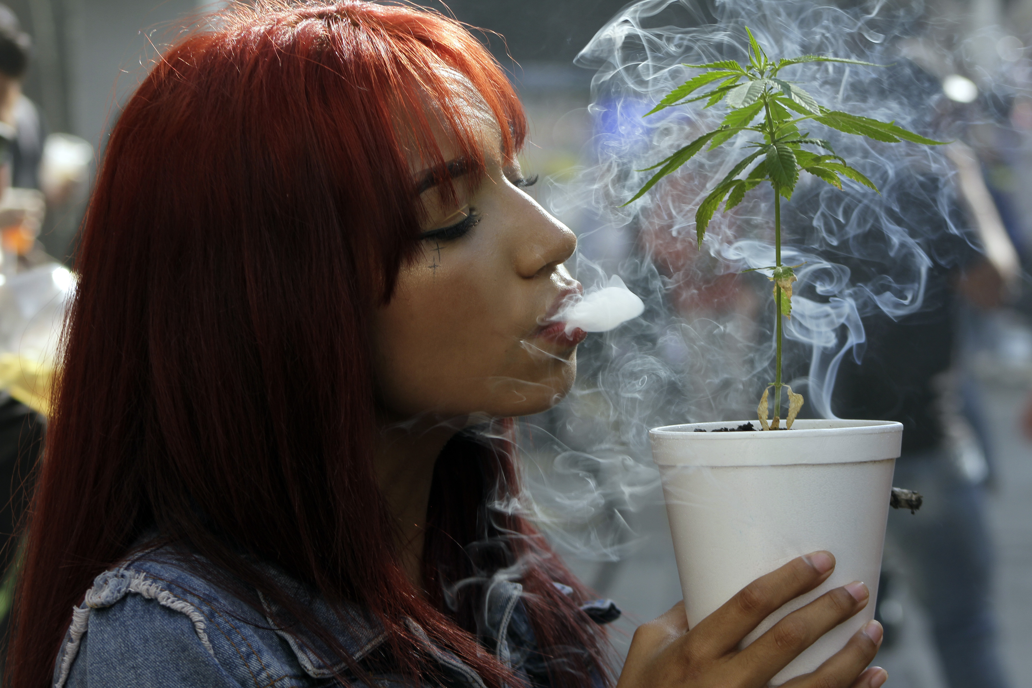 woman smoking marijuana