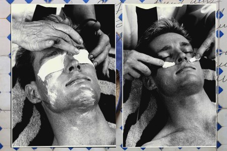 A man with lotion on his face.