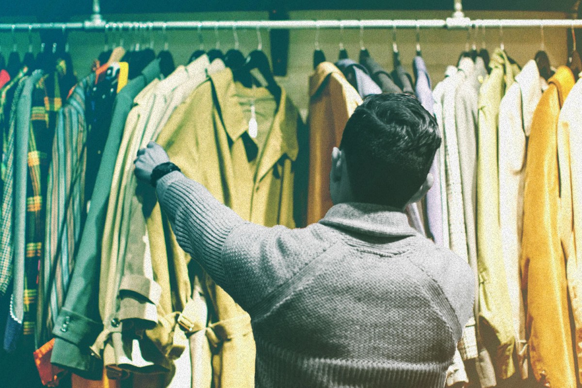 man shopping for vintage clothes
