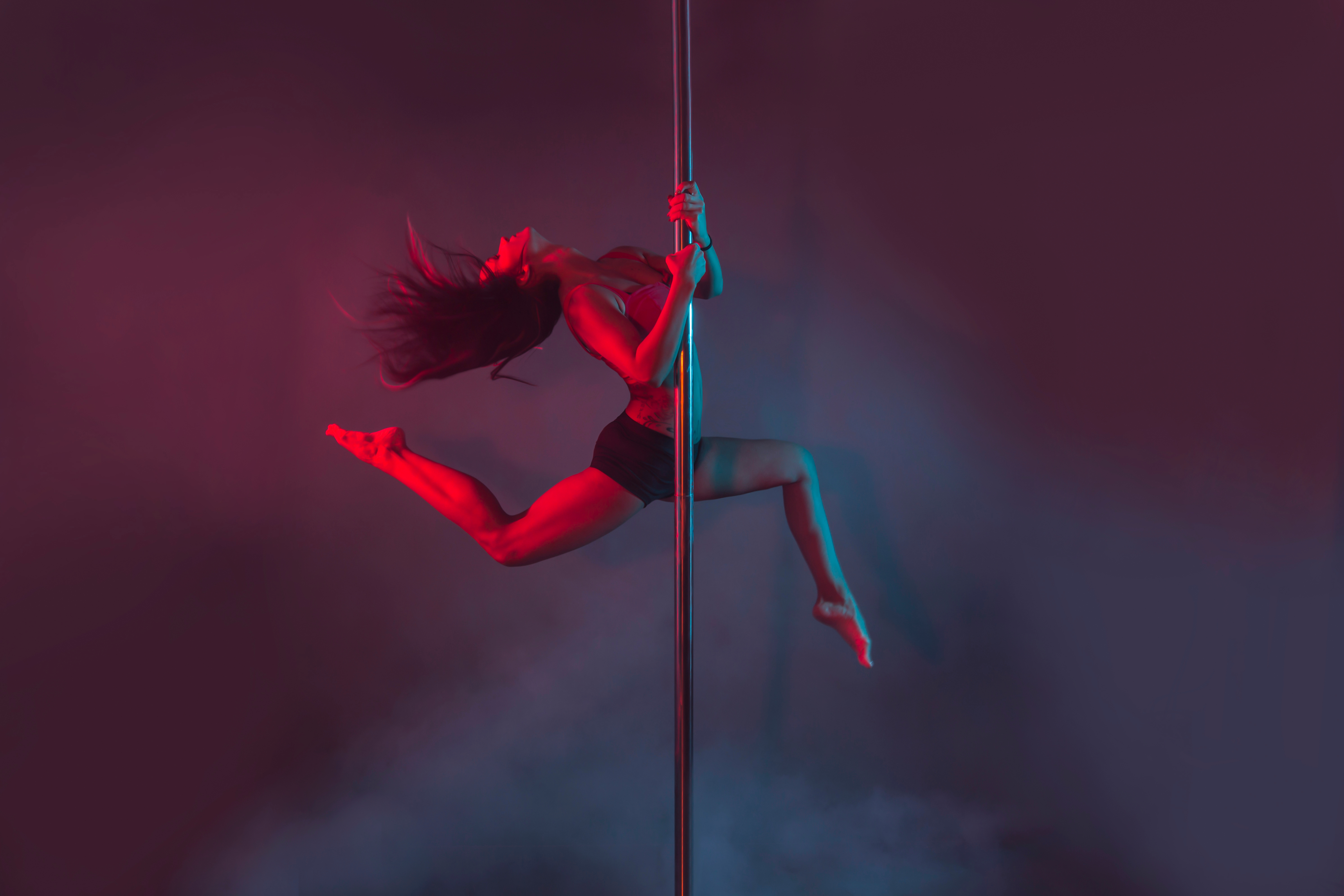 woman pole dancing