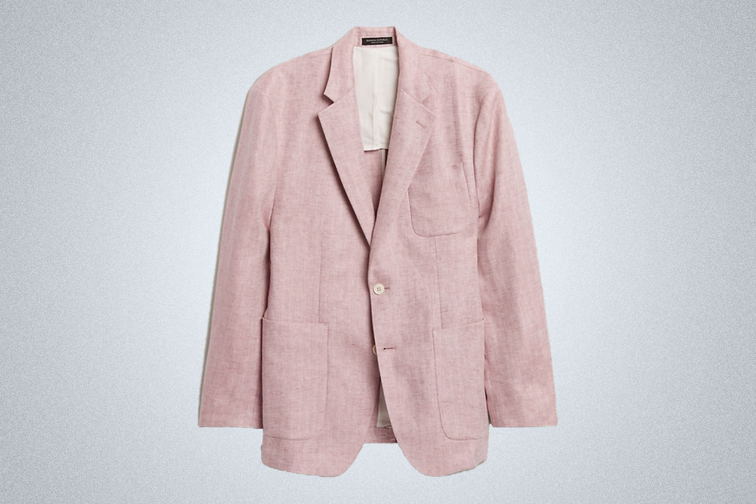 a pink blazer on a grey background 