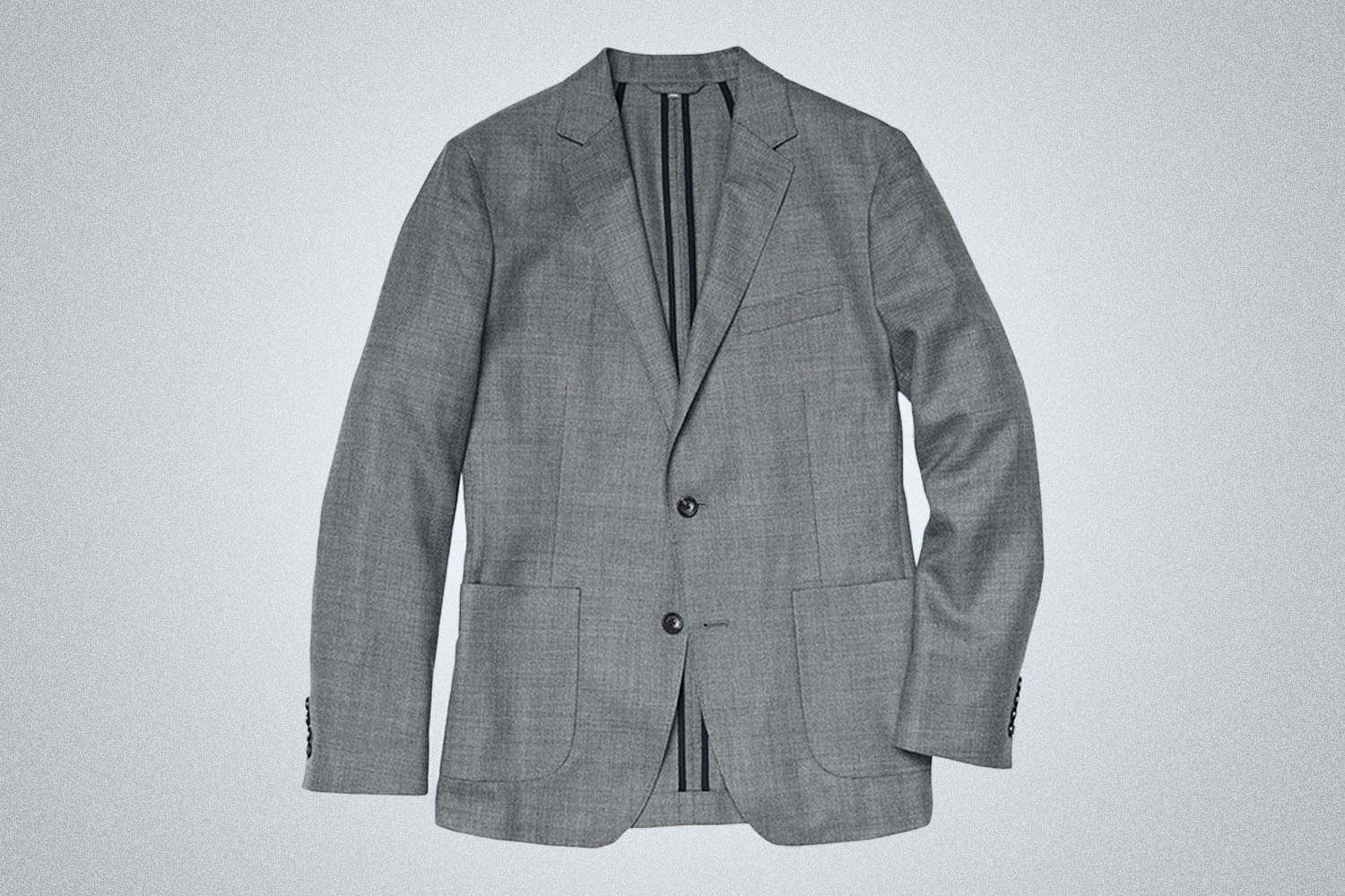 a grey wool blazer on a grey background
