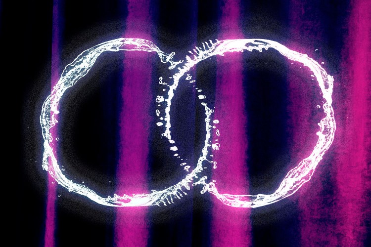 two white rings intersecting over a purple background