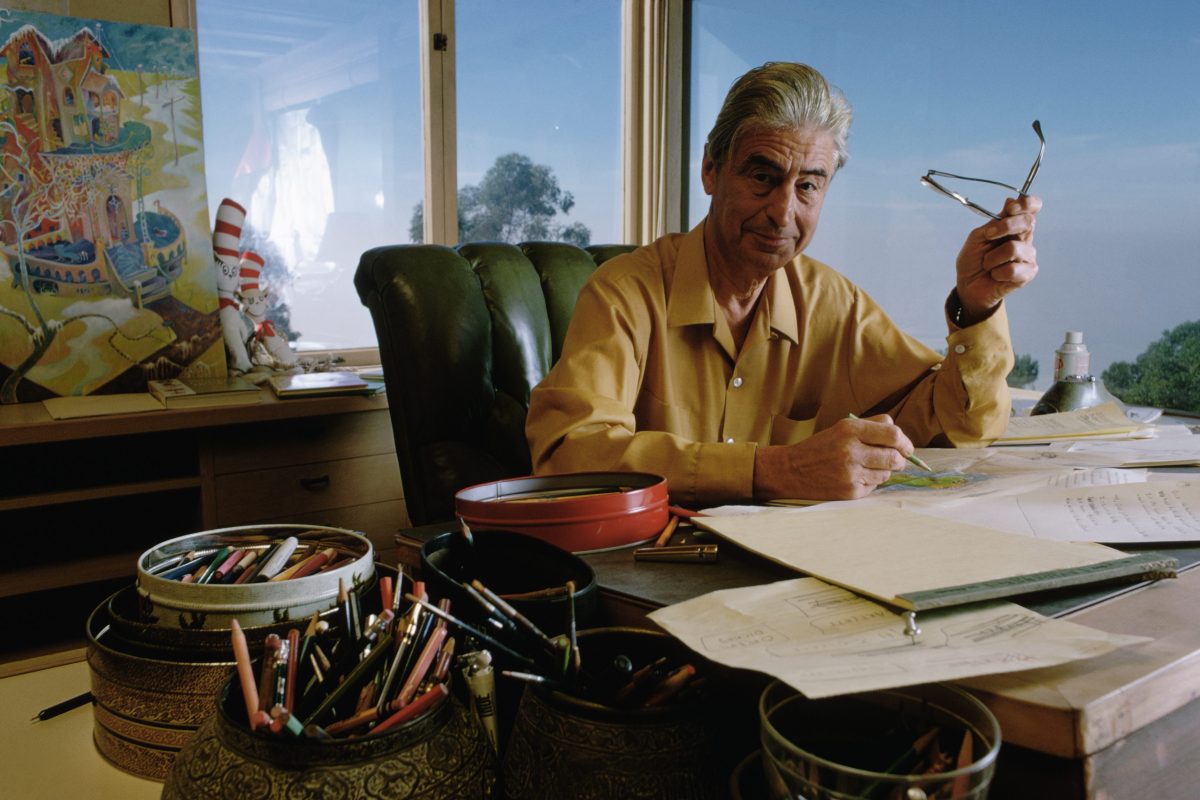dr. seuss drawing at his desk