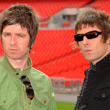 Noel Gallagher (left) and Liam Gallagher of Oasis pose at Wembley Stadium on October 16, 2008 in London, England.