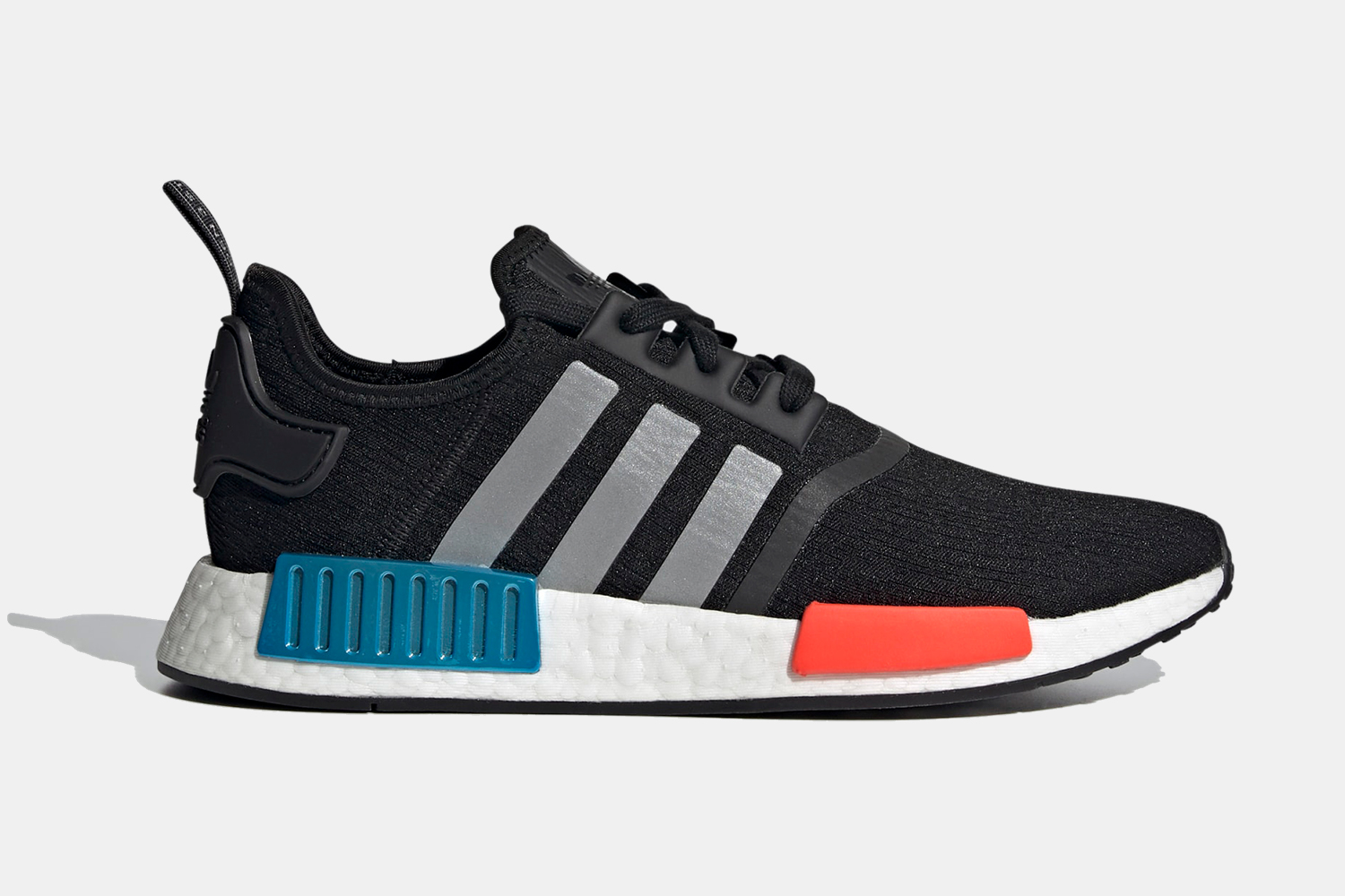 Adidas NMD_R1 casual sneakers with blue and orange accents