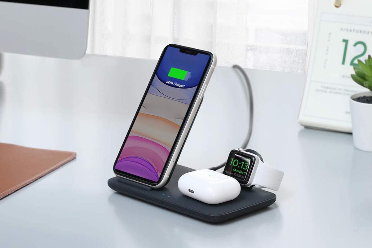 The Anker PowerWave 3 charging three Apple devices