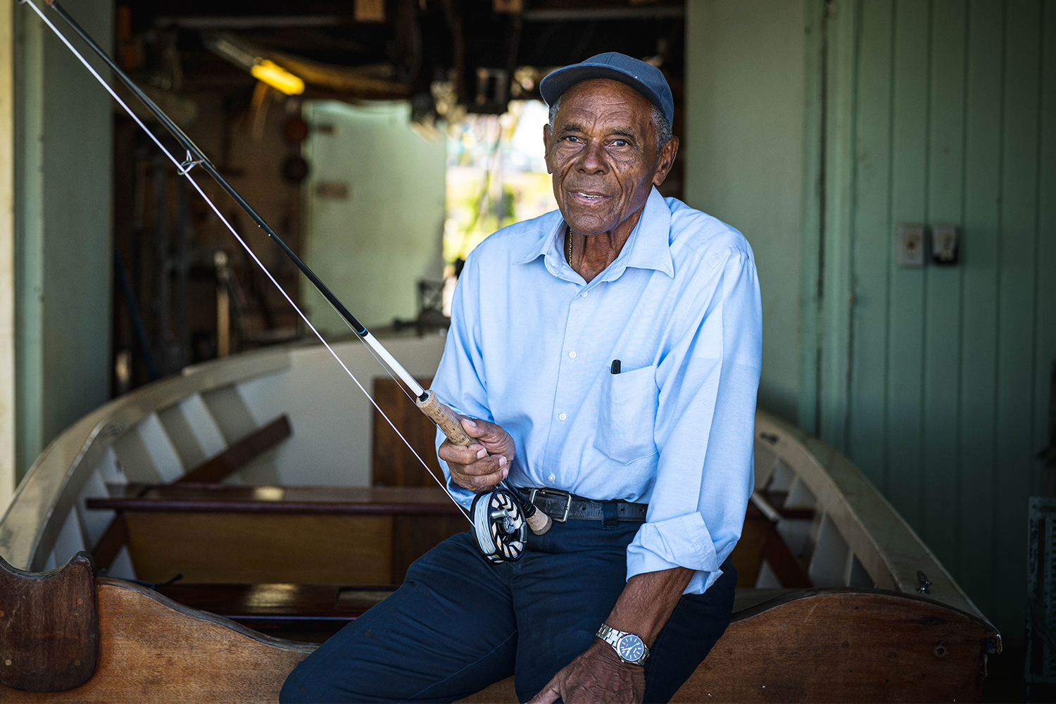Fly fishing guide Ansil Saunders holds a fishing rod on Bimini