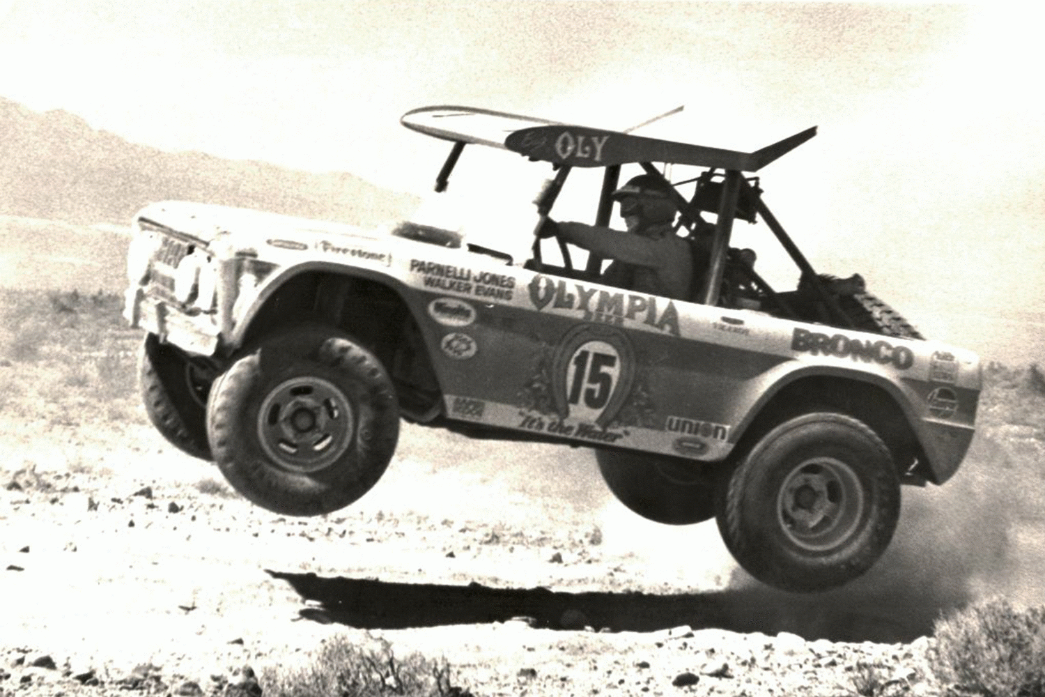 Parnelli Jones jumping his Big Oly Ford Bronco in the dirt