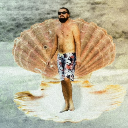 Leonardo DiCaprio in a swimsuit standing in a giant seashell